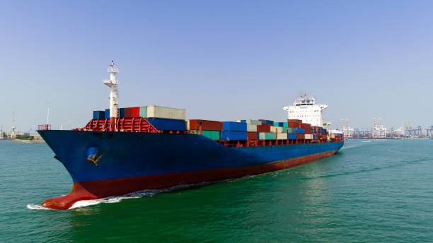 istock cargo logistic container ship sailing in sea to import export goods and distributing products to dealer and consumers worldwide, by container ship Transport, commercial port background, 1677465146