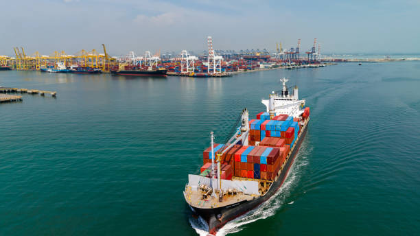 istock cargo logistic container ship sailing in sea to import export goods and distributing products to dealer and consumers worldwide, by container ship Transport, commercial port background, 1677466806