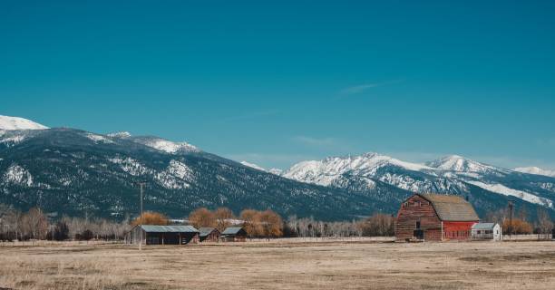 istock Majestic mountain range with snow-capped peaks and lush green valleys 1677482266