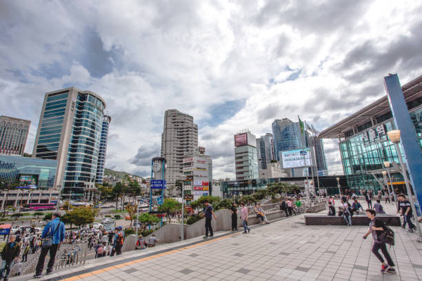 Seoul, KOREA - September 3, 2023: After the rainy, the daylight illuminates Seoul Station Square in the middle of the day, and even every dark spot shines in every corner. The old Seoul Station, also known as 'Culture Station Seoul' (Korean: '문화역서울'), originally named Keijo (Gyeongseong) station and designed by Tsukamoto Yasushi of Tokyo Imperial University, was finished in November 1925. Built of red brick at the time, the station was designed in a variety of styles and featured a Byzantine-style central dome and a centrally symmetrical layout. The floor of the first floor central hall was covered with granite, and the walls were covered with artificial stone. The wooden floor inside the building's VIP lounge was finished with birch, and a Western-style restaurant was located on the second floor. It was now the modern Town Square.  (Photo by Young Jin Lee)