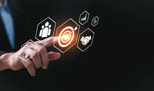 istock planning development leadership and customer target group concept.businees man touch target icon which for planning development leadership and customer target. 1677590658