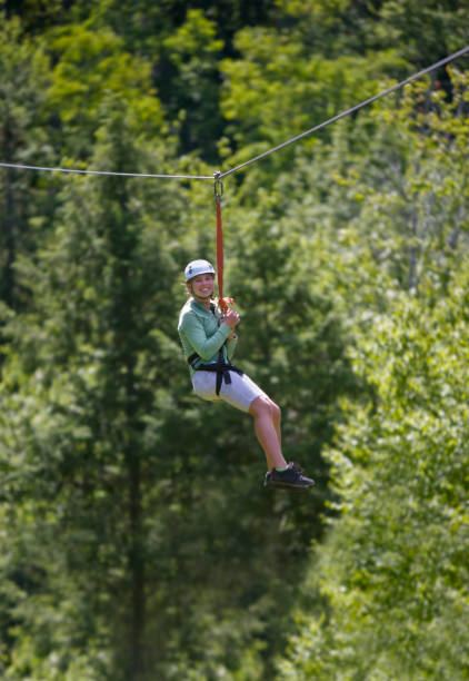 istock Girl taking  Zipline Trip down a Mountain 167760835