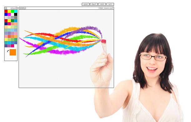 a designer is painting with a digital brush in a photoshop-like program. the complete program gui is designed by myself. focus is on the program gui & brush, the face is out of focus.