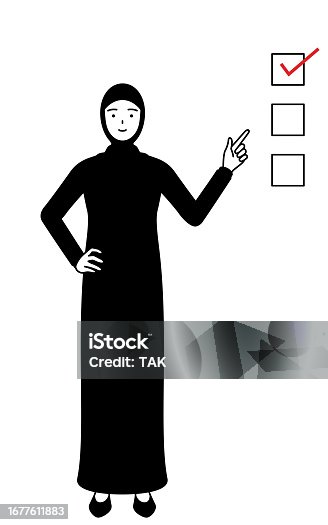 istock Muslim Woman pointing to a checklist. 1677611883