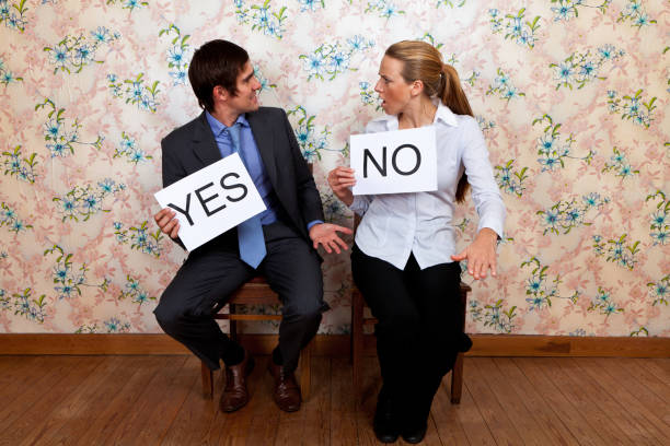 istock Mr Yes and Miss No fighting 167761412