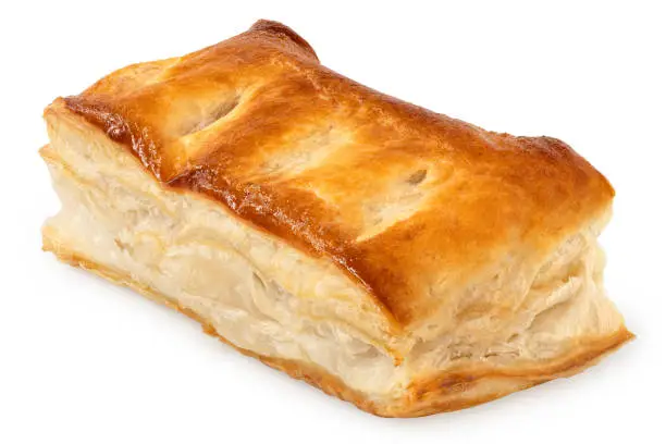 Savory filled puff pastry isolated on white.