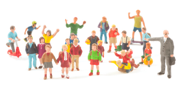 cheerful plasticine people standing in a circle - teamwork concepts - isolated on white