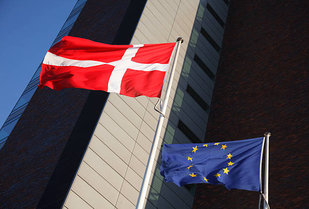 Dannebrog and EU flags stock photo