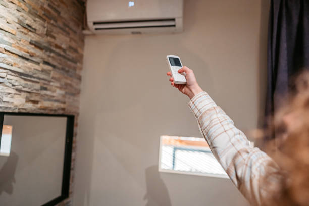 istock Turning On The Air Conditioner 1677676204