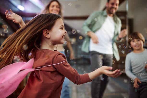 istock Joyful little girl having fun while dancing at home. 1677677759
