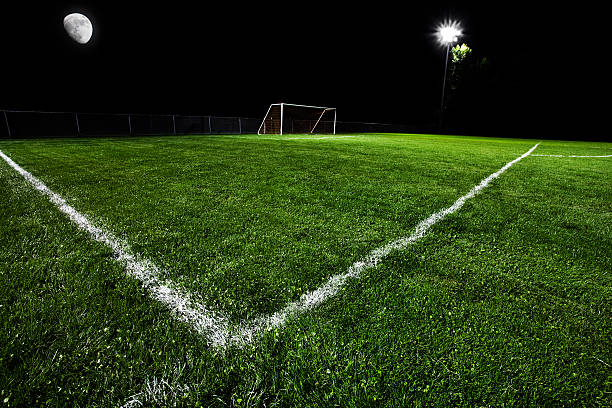 istock Soccer Field at Night 167769299