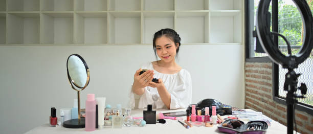 istock Female beauty blogger recording everyday make up tutorial and communicating with social media 1677710508