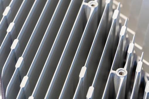 Close-up of metal surface of industrial equipment radiator