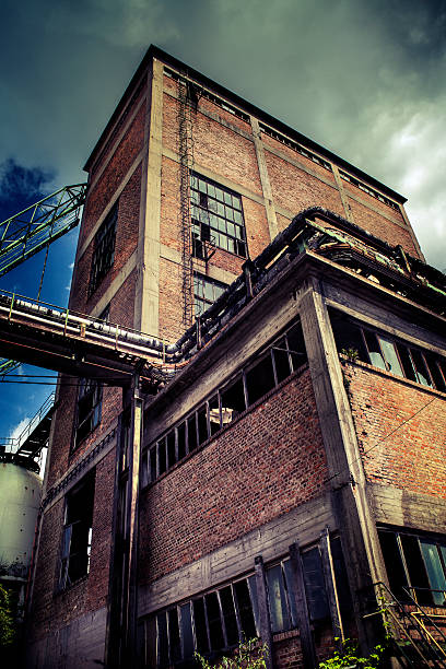 istock Old factory buildings facade 167771189
