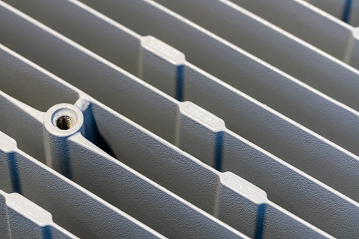Close-up of metal surface of industrial equipment radiator