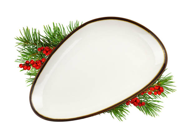 istock White triangle empty dish with brown edging and Christmas decorations isolated 1677713717
