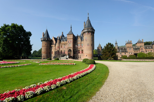Front view of castle De Haar, the largest castle in the Netherlands. From 1892 on it was rebuilt on an ancient ruin, in neo-gothic style and inspired by the Middle Ages. The 15th century walls were restored and integrated in the new design. It took 20 years to complete the entire project.