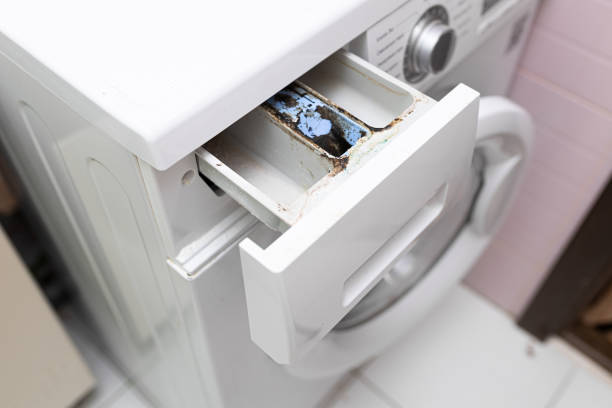 istock Laundry machine dispenser compartment for soap and powder detergent and conditioner with corrosion, rust. Tech hygiene 1677756217