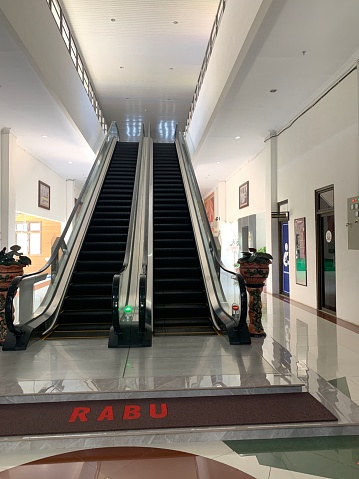 banda aceh, indonesia, september 13, 2023: portrait of twin escalators without people for High Prosecutor's Office