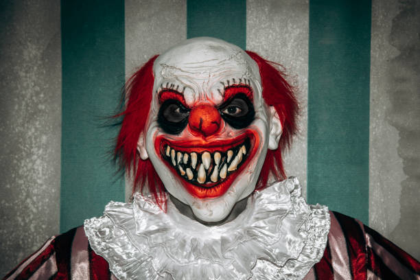 istock mad evil redhead clown in the circus 1677783585