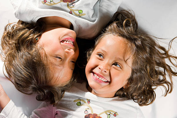 TWINS SMILING stock photo