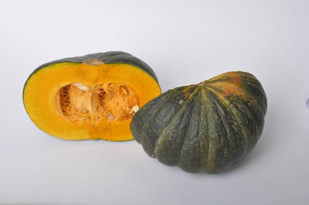 istock green pumpkin on a white background 1677830069