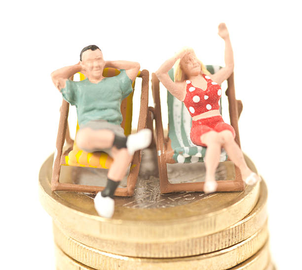 holiday little people in deck chairs figurine stock pictures, royalty-free photos & images
