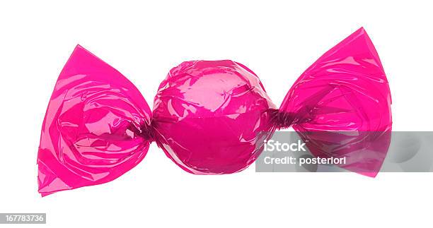 Candy Wrapped In Pink Foil Stock Photo - Download Image Now - Candy, Cut Out, Hard Candy
