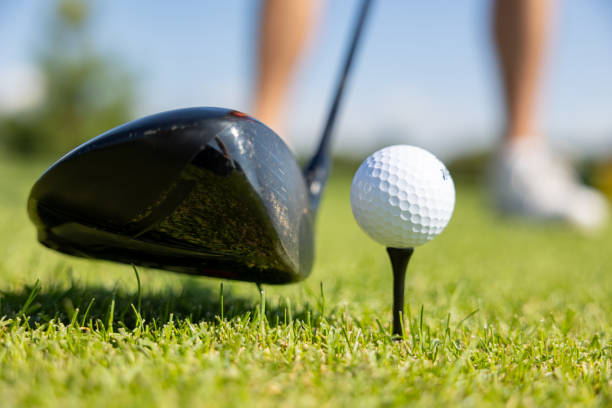 istock Golf sticks and golf balls for background with green grass 1677838159