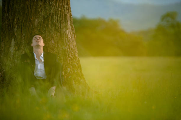 istock Businessman relaxing in nature 167785709
