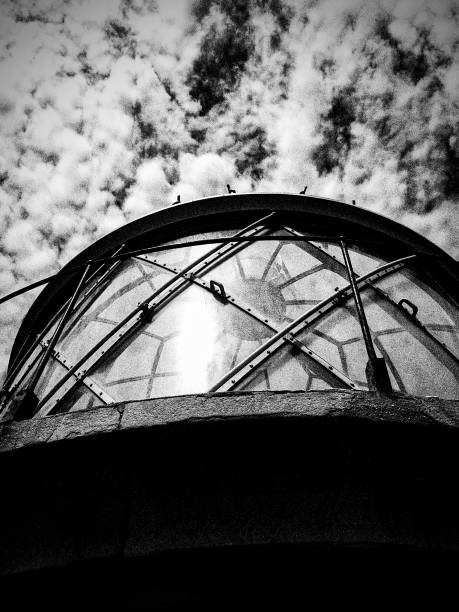 istock Lighthouse that illuminates ships to port 1677863221