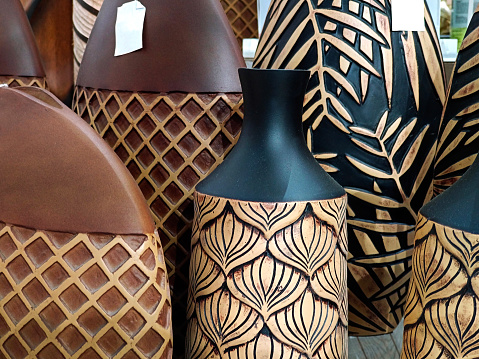 Wooden flower pot pattern design emboss. Closeup view of flower pots in interior decor Shop.