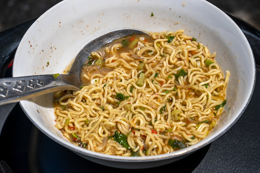 ready-to-eat instant noodles in a large white bowl