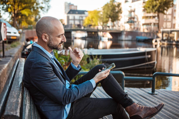 Handsome elegant single gay male 50s working man in Amsterdam