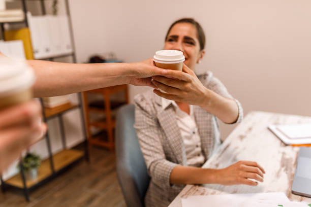 istock Sharing a coffee with a coworker is caring 1677973830