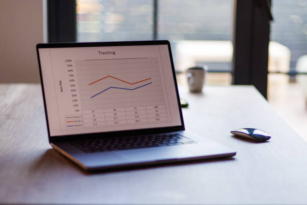 istock Laptop with graph on the screen on a desk 1677978794