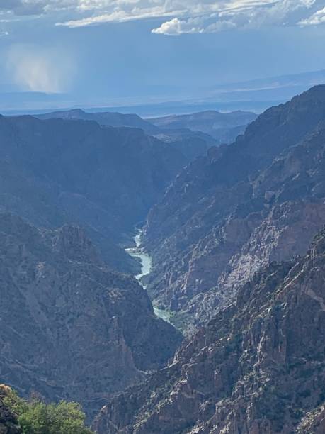 istock Stream Flowing through a Narrow Valley Canyon 1677988953