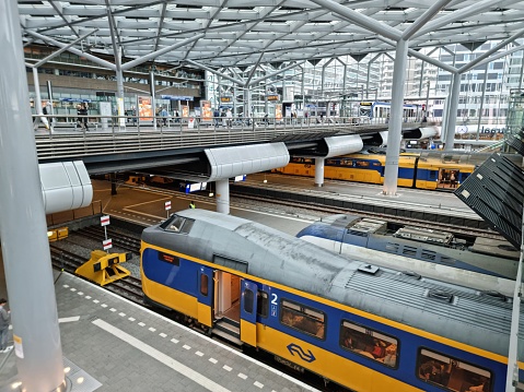 The Hague (Den Haag ) Railway station Centraal. The Hague is the country's administrative centre and its seat of government. The city has a population of arround 550'000 citizens. The image shows the main railway station with several trains.