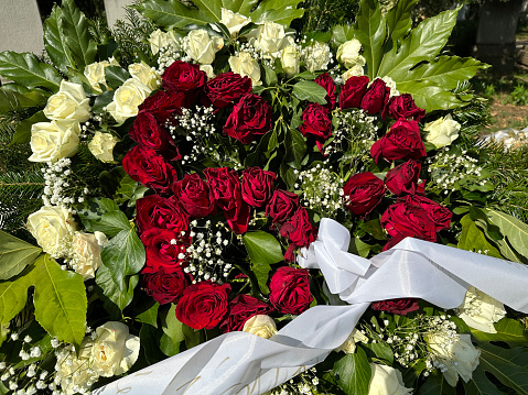 Close-up of the artificial red roses flower