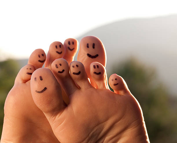 Happy Feet Smiling toes  with sky and trees. reflexology photos stock pictures, royalty-free photos & images