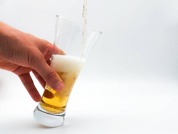 istock Pouring beer into a glass 1678064988