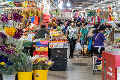 Singapore - August 30,2023 : Scenic view of the wet market in Singapore, people can seen buying the vegetables and grocery around it.