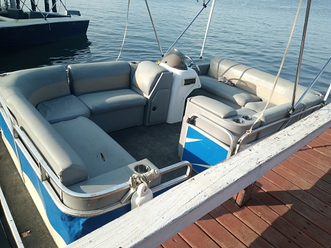 Luxury Boat Moored in Sunny Autumn Harbor