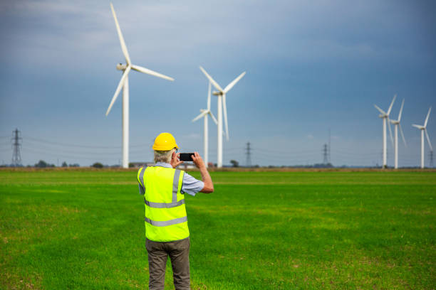 istock Maintenance engineer working at the wind farm checking on the turbines 1678149719