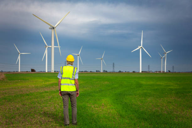 istock Maintenance engineer working at the wind farm checking on the turbines 1678149749