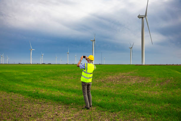 istock Maintenance engineer working at the wind farm checking on the turbines 1678150268