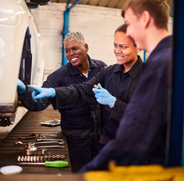 istock female auto mechanic tutor with students 1678163463