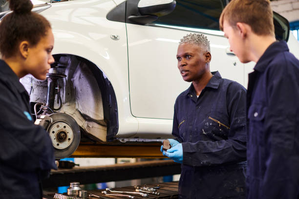 istock female auto mechanic tutor with students 1678166875
