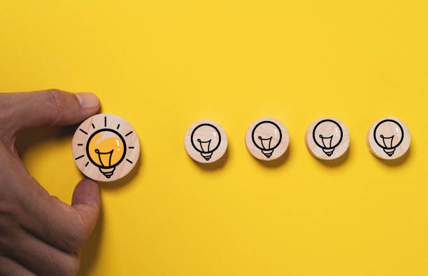 istock Hand holding glowing lightbulb move out from lamp icon  for creative thinking idea innovation and problem solving solution concept. 1678199875