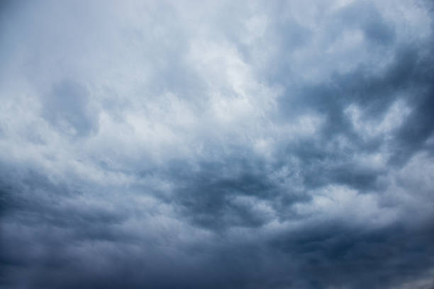 istock dark stormy sky, dark clouds, dark sky with converging heavy clouds and violent storm before rain, sky and environment of bad or gloomy weather, carbon dioxide emissions, greenhouse effect, global warming, climate change, sky before hail 1678200408